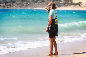 Kitesurf instructor using radio guidance